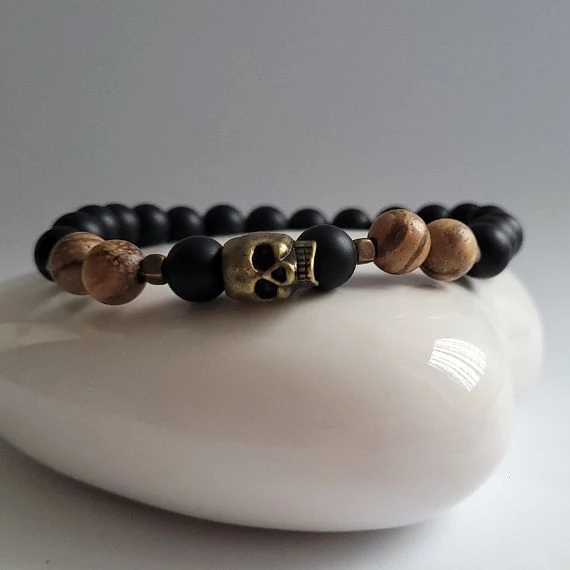 Férfi karkoto koponya medállal